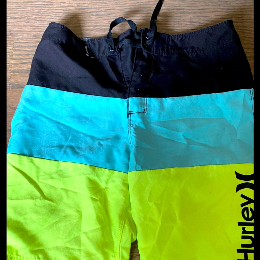 Board short style swim trunks. No net